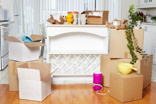 Office desks and chairs being handled for a business relocation